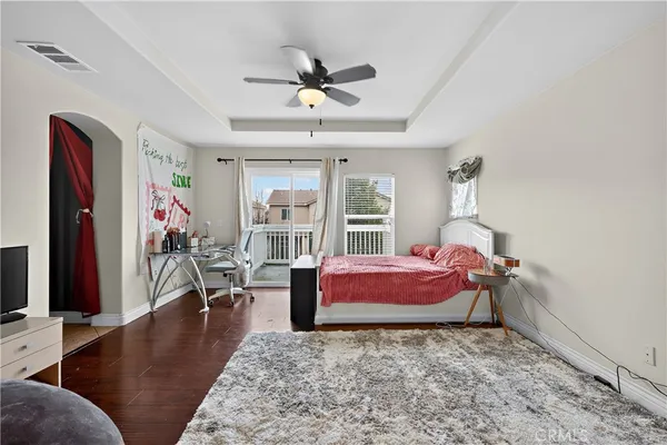 a view of a balcony with wooden fence and floor