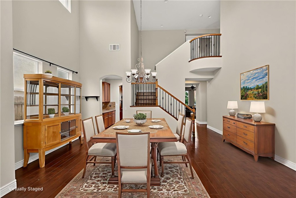 1277 Baxter Drive Merced, CA 95348 - Photo 4 of 63 a dining room with wooden floor and furniture