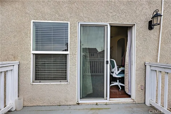 a bathroom with a toilet and a bathtub