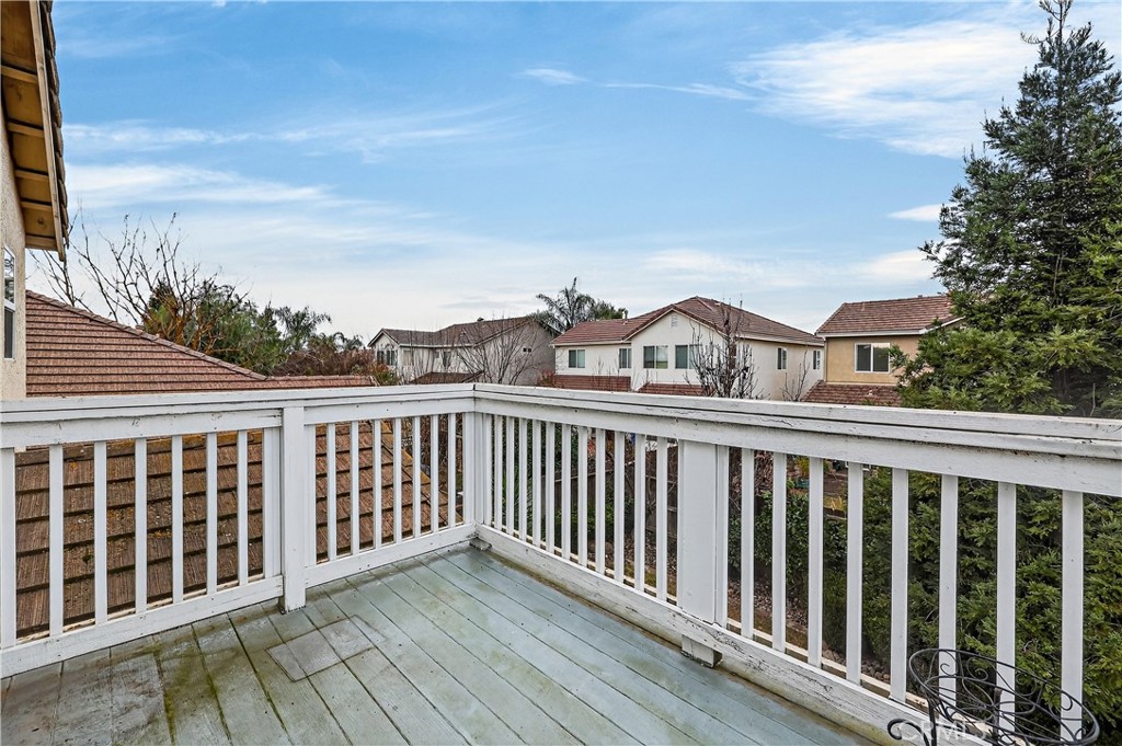 1277 Baxter Drive Merced, CA 95348 - Photo 43 of 63 a view of a balcony with wooden fence and floor