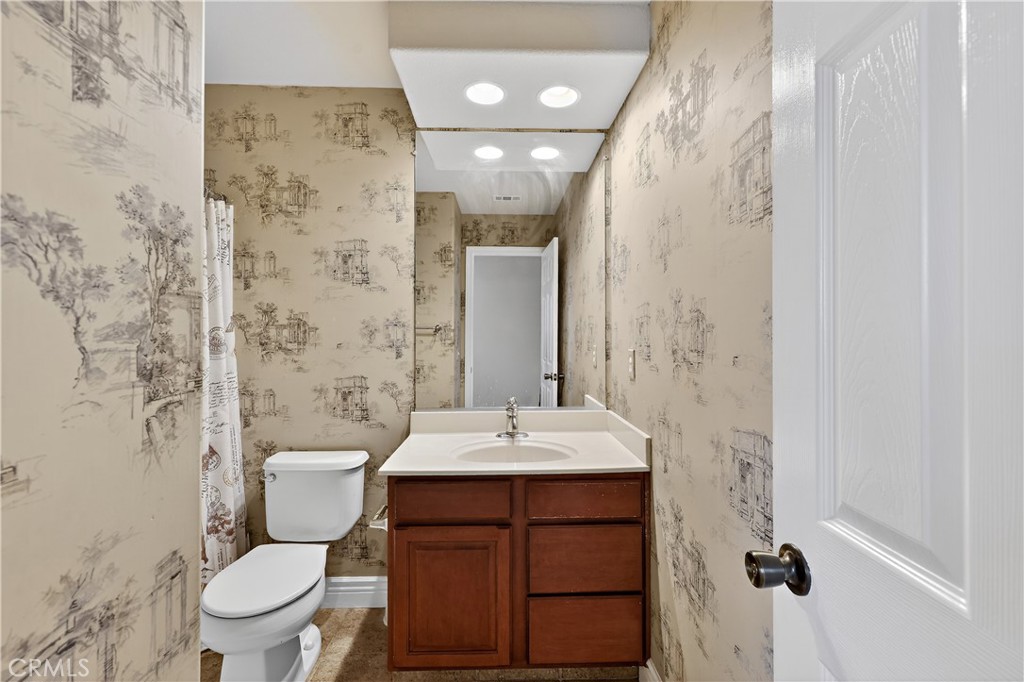 1277 Baxter Drive Merced, CA 95348 - Photo 48 of 63 a bathroom with a sink a toilet and shower