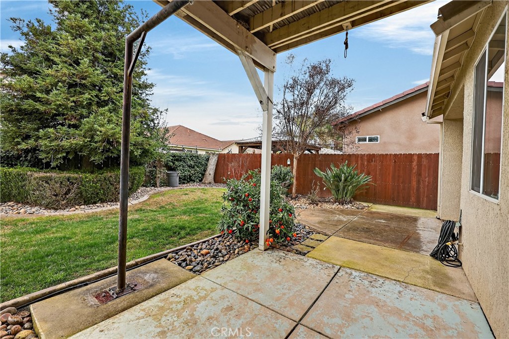 1277 Baxter Drive Merced, CA 95348 - Photo 53 of 63 a view of a backyard with garden