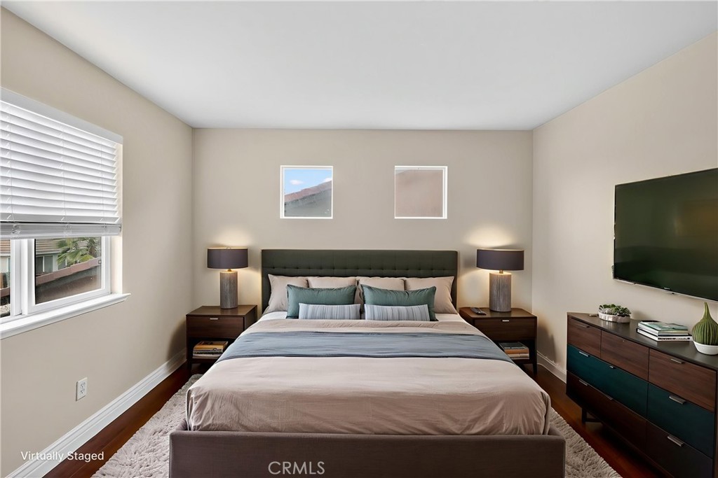 1277 Baxter Drive Merced, CA 95348 - Photo 6 of 63 a bedroom with a bed and a flat screen tv