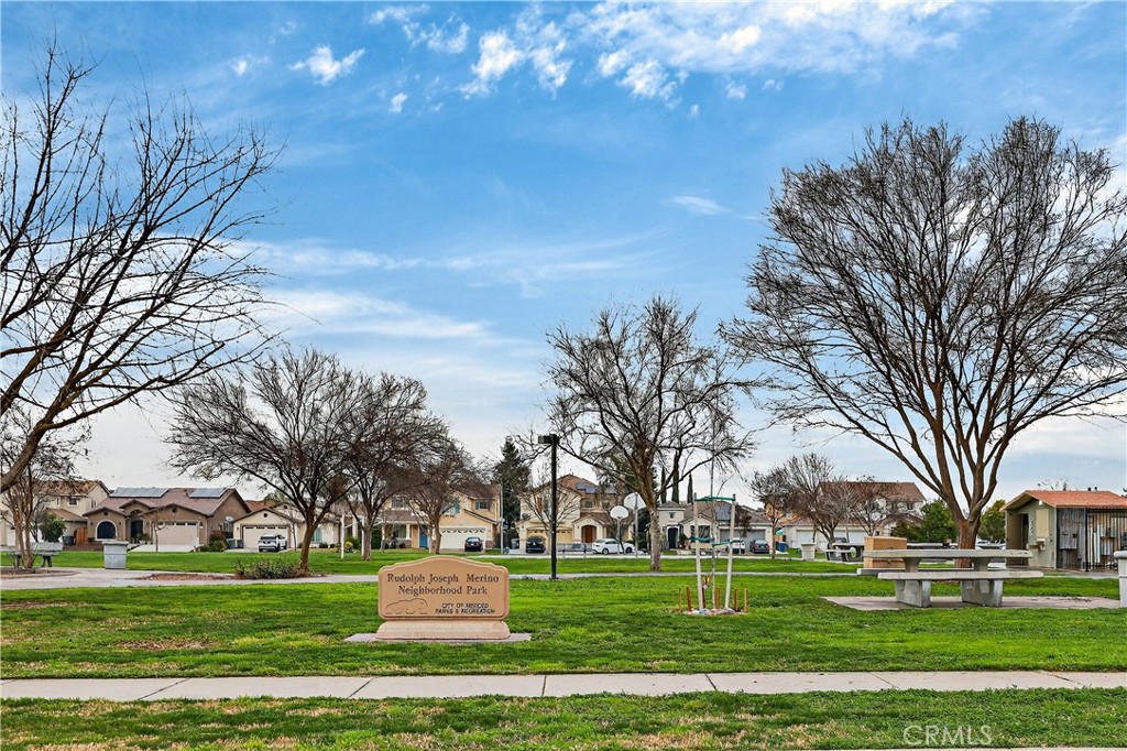 1277 Baxter Drive Merced, CA 95348 - Photo 63 of 63 a front view of a building with trees in the background