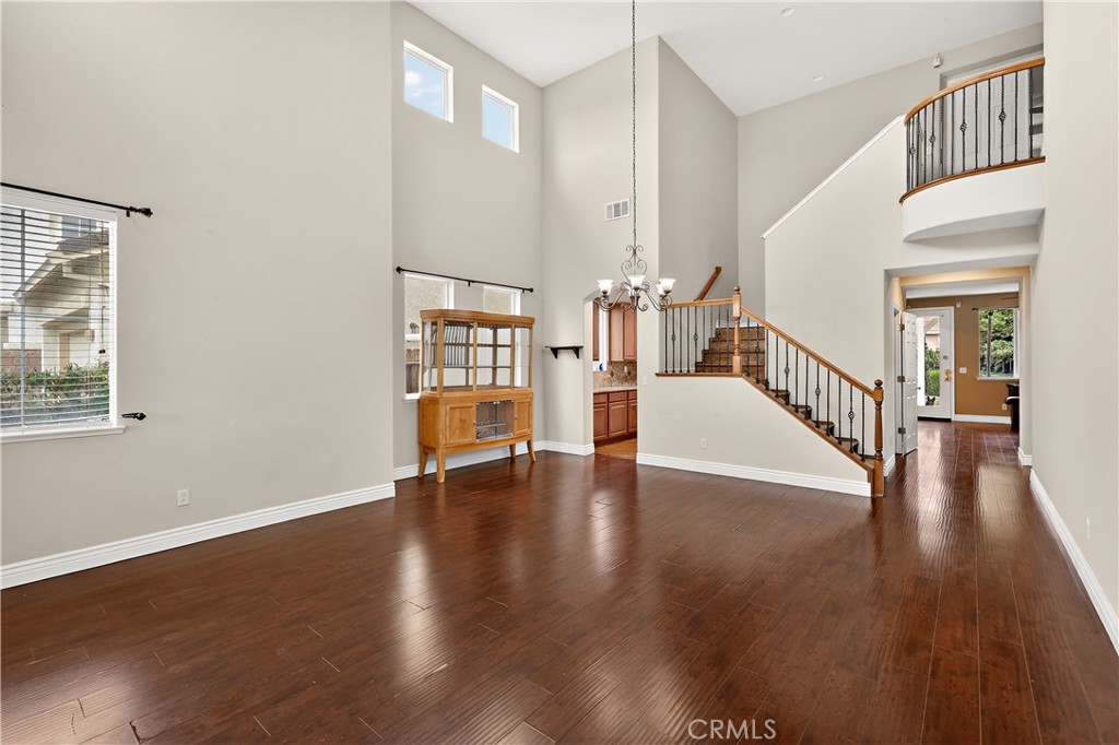 1277 Baxter Drive Merced, CA 95348 - Photo 10 of 63 a view of an entryway with wooden floor