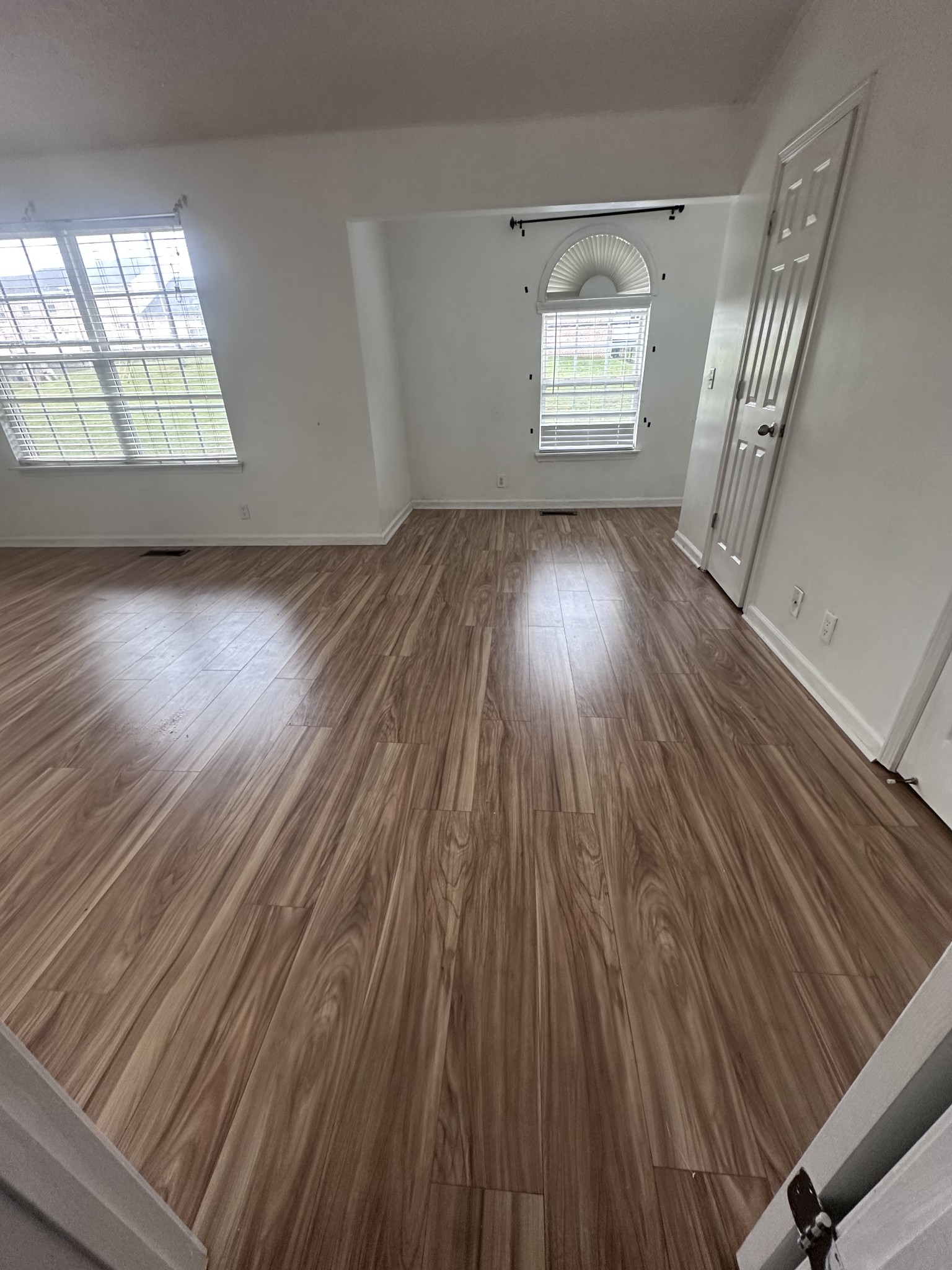 3001 Hamilton Church Road, Unit 403 Antioch, TN 37013 - Photo 14 of 21 an empty room with wooden floor and windows