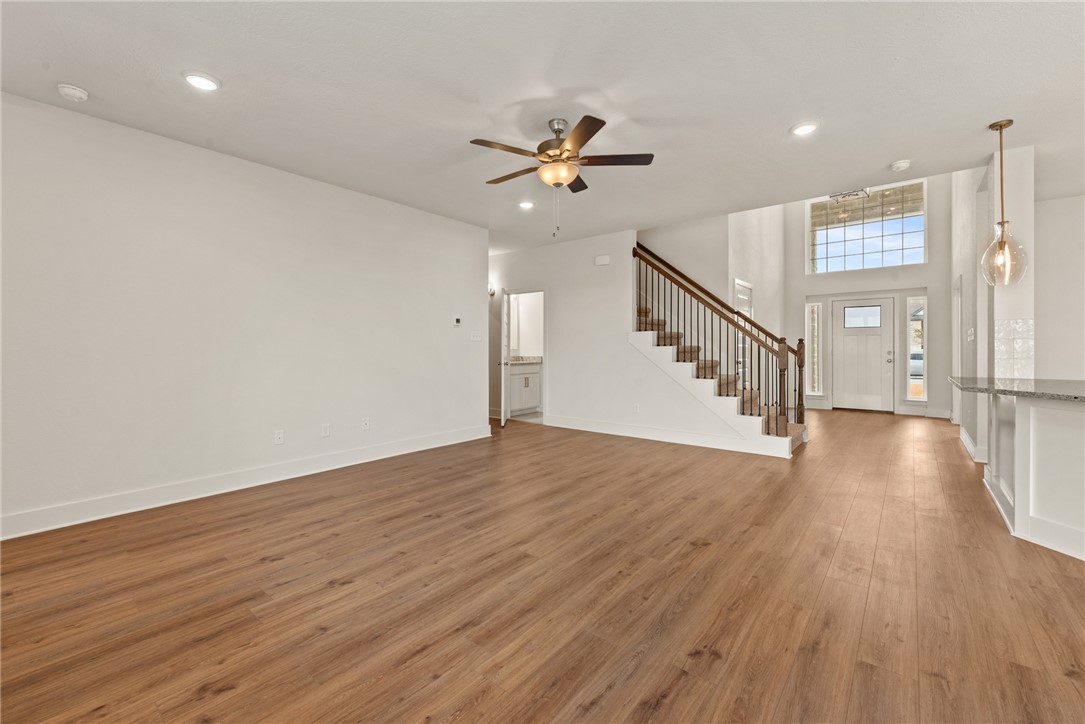 5626 Hayduke Ln. Bryan, TX 77802 - Photo 15 of 49 wooden floor in an empty room with a window