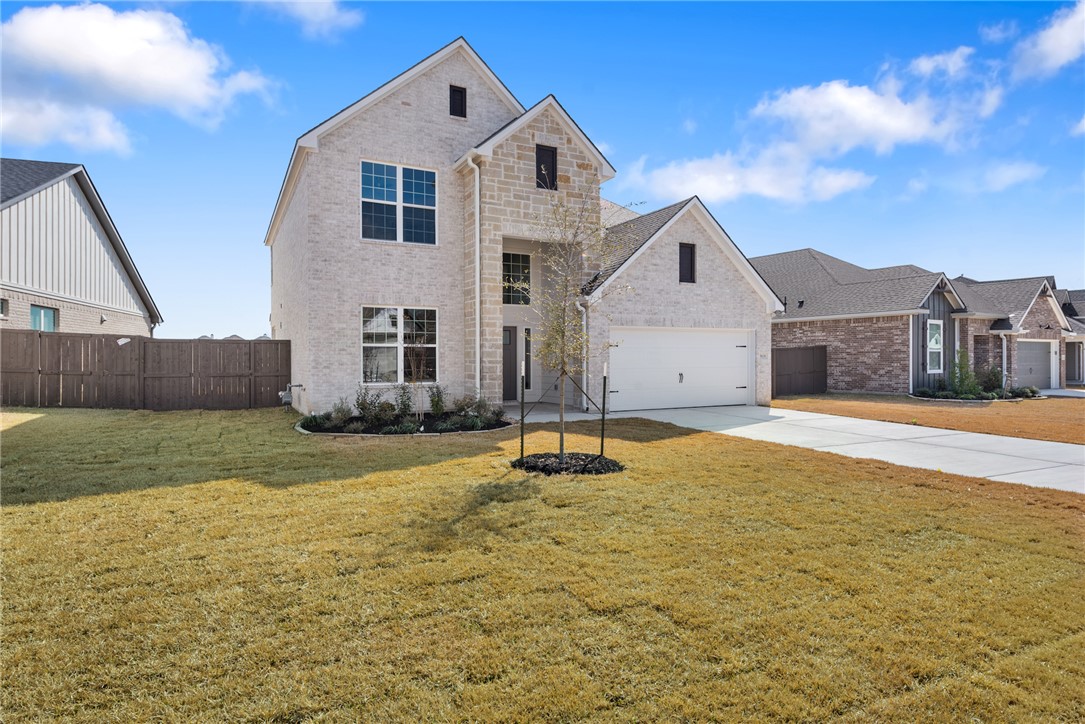 5626 Hayduke Ln. Bryan, TX 77802 - Photo 2 of 49 a house view with swimming pool in front of it