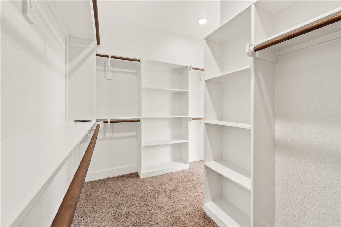 5626 Hayduke Ln. Bryan, TX 77802 - Photo 28 of 49 a view of an empty walk in closet
