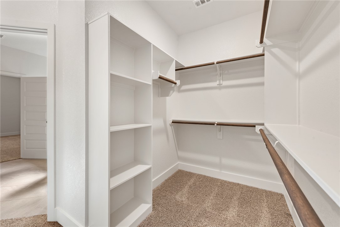 5626 Hayduke Ln. Bryan, TX 77802 - Photo 29 of 49 a view of an empty walk in closet