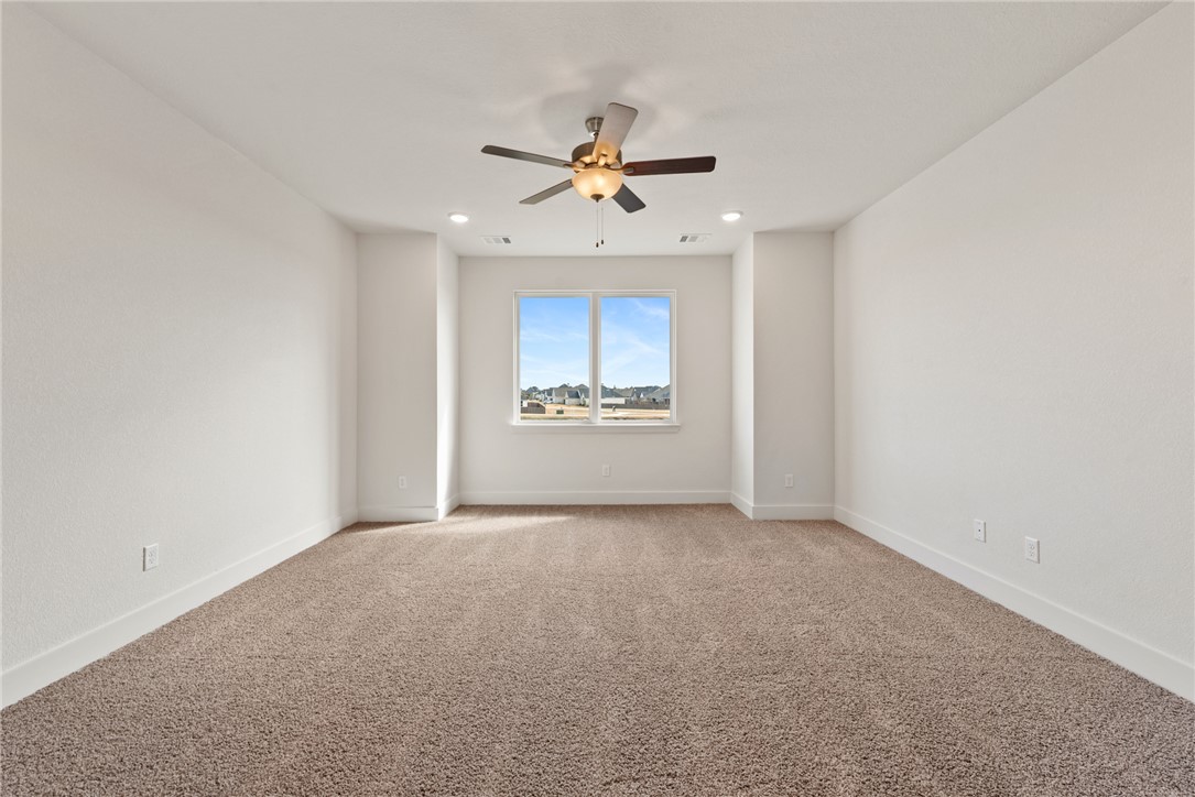 5626 Hayduke Ln. Bryan, TX 77802 - Photo 32 of 49 a view of an empty room with a window