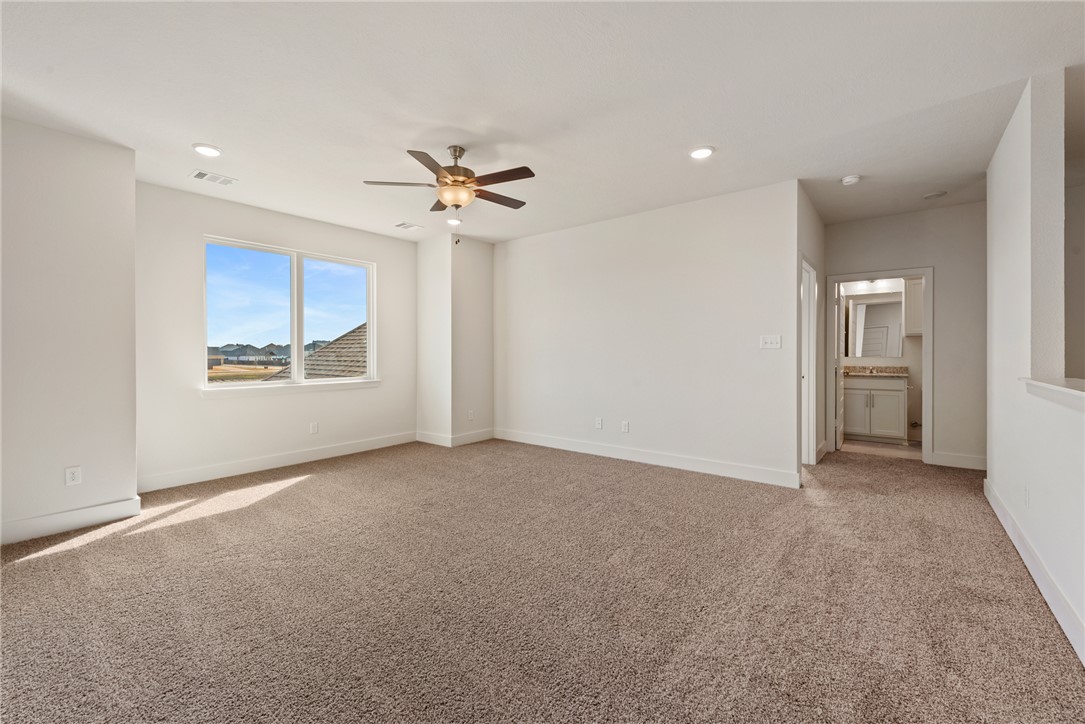 5626 Hayduke Ln. Bryan, TX 77802 - Photo 35 of 49 a view of an empty room with a window