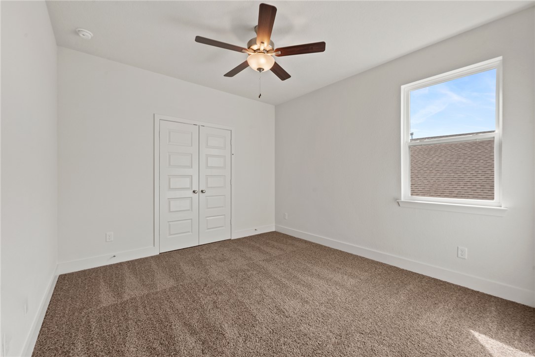 5626 Hayduke Ln. Bryan, TX 77802 - Photo 43 of 49 a view of an empty room with a window