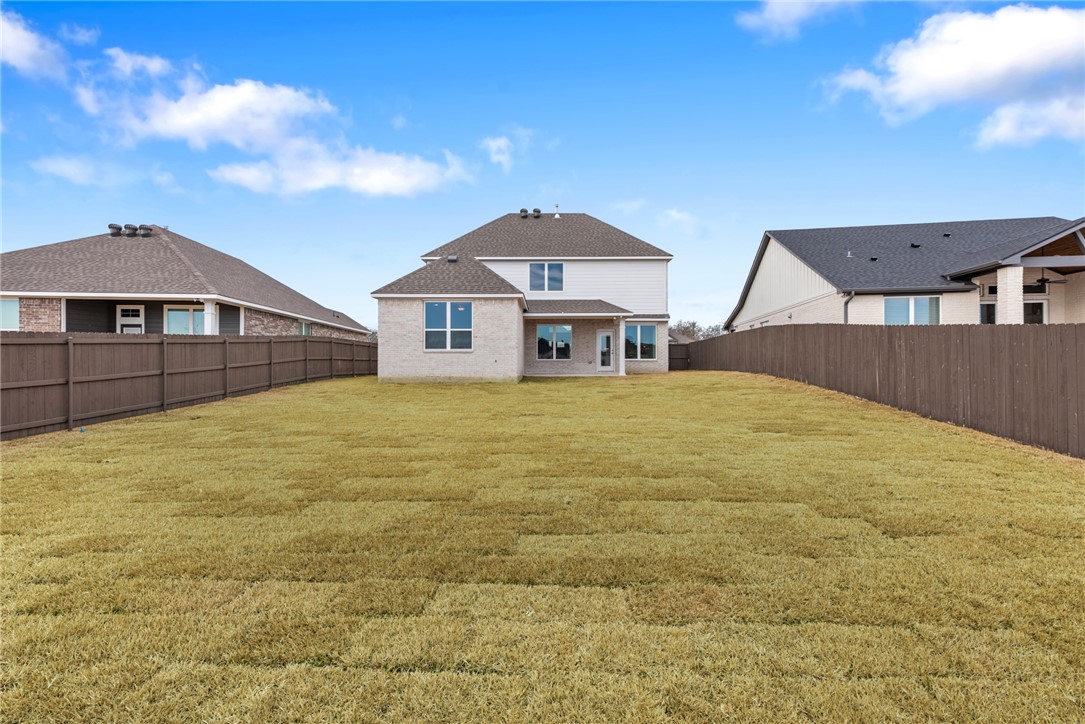 5626 Hayduke Ln. Bryan, TX 77802 - Photo 48 of 49 a view of a house with a yard