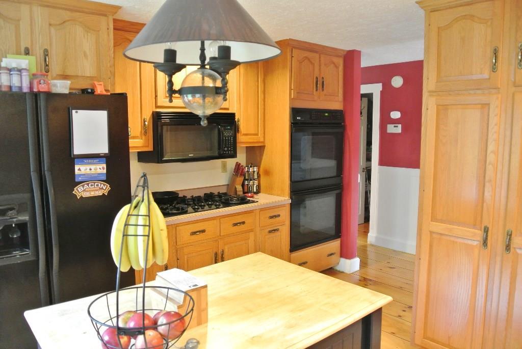 527 Wingood Road Windsor, ME 04363 - Photo 6 of 33 A chef's wall... double oven, gas...