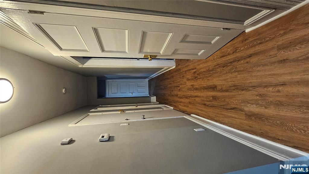 78 North Arlington Avenue, Unit 2 East Orange, NJ 07017 - Photo 8 of 9 a view of a hallway with wooden floor
