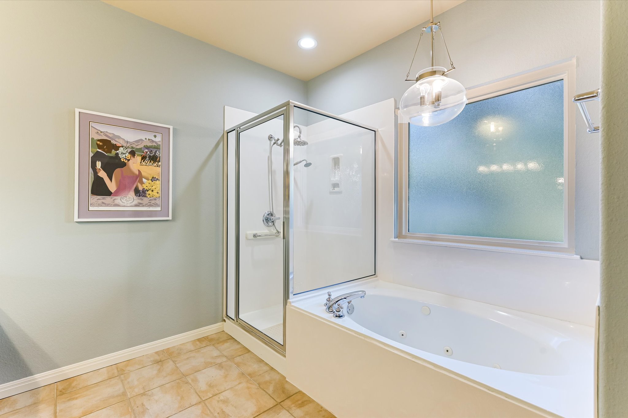 786 Ranchers Club Lane Driftwood, TX 78619 - Photo 19 of 33 Bathroom featuring a stall shower, a jetted tub, and light tile patterned flooring