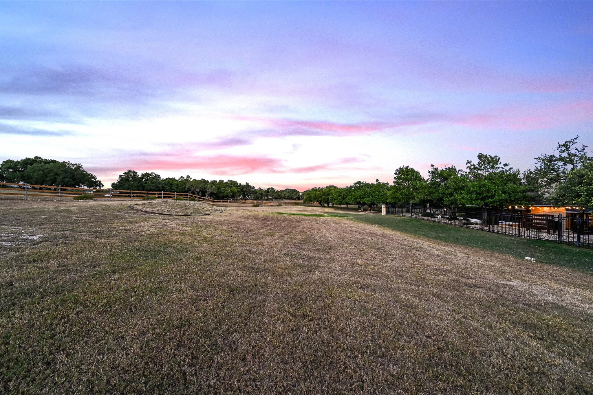 786 Ranchers Club Lane Driftwood, TX 78619 - Photo 32 of 33 Yard at dusk featuring a view of rural / pastoral area