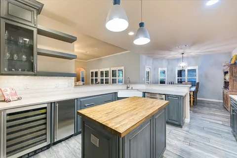 a kitchen with lots of counter space and a sink