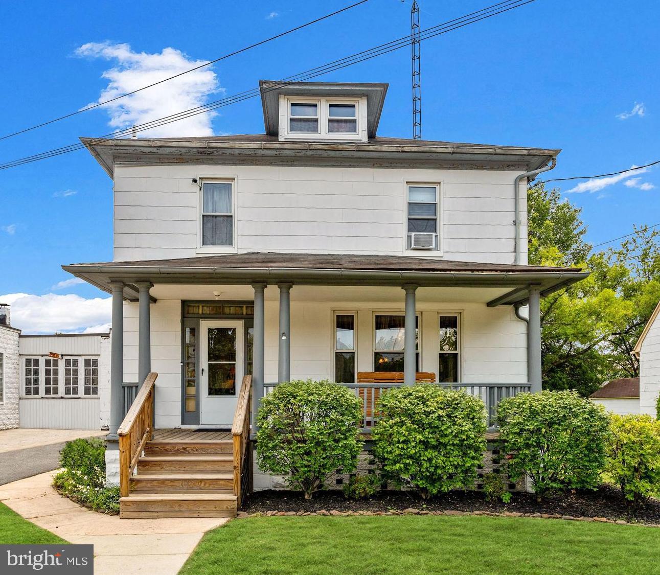 8029 Philadelphia Road Baltimore, MD 21237 - Photo 1 of 29 a front view of a house with garden
