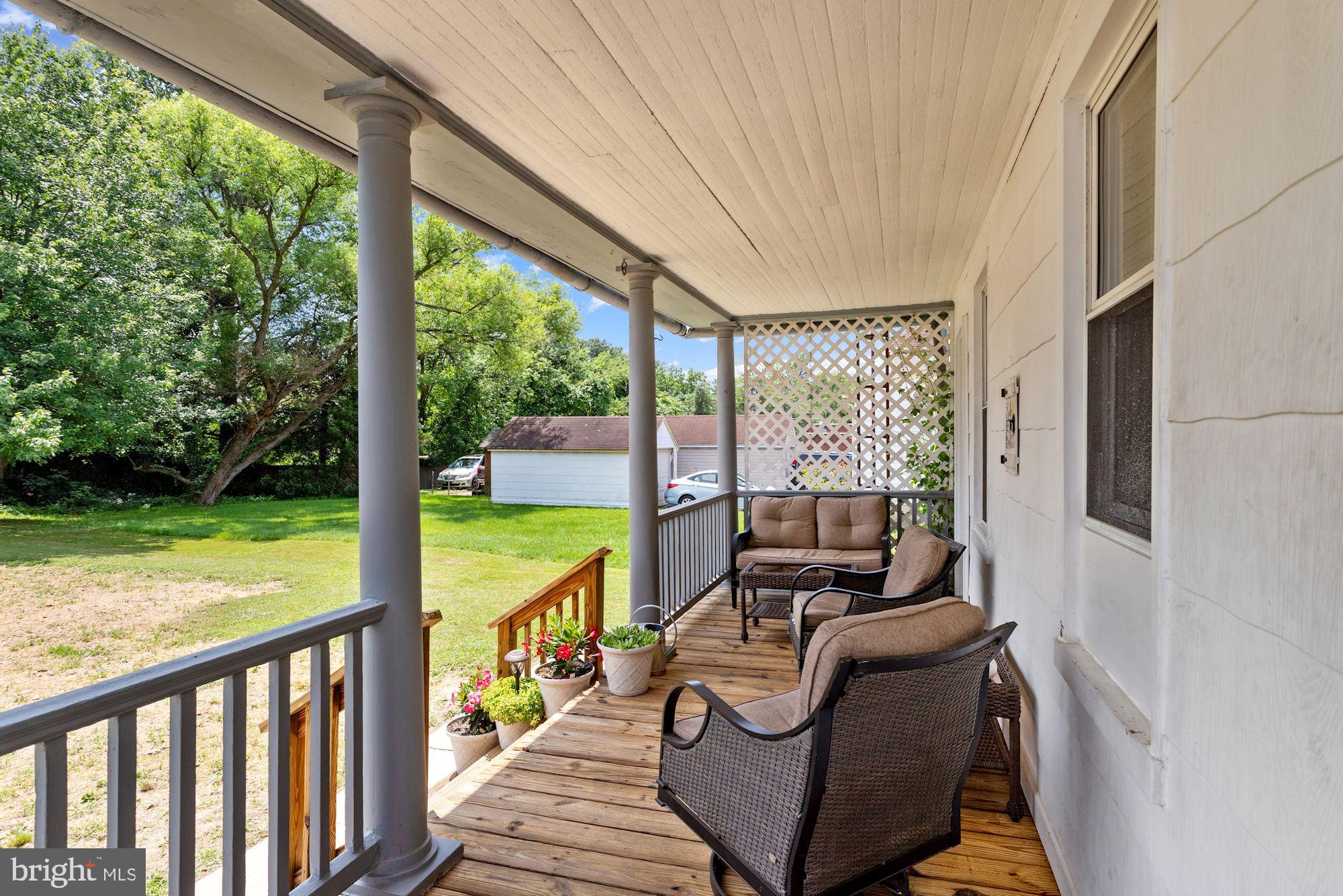 8029 Philadelphia Road Baltimore, MD 21237 - Photo 3 of 29 a view of a two chair in the balcony