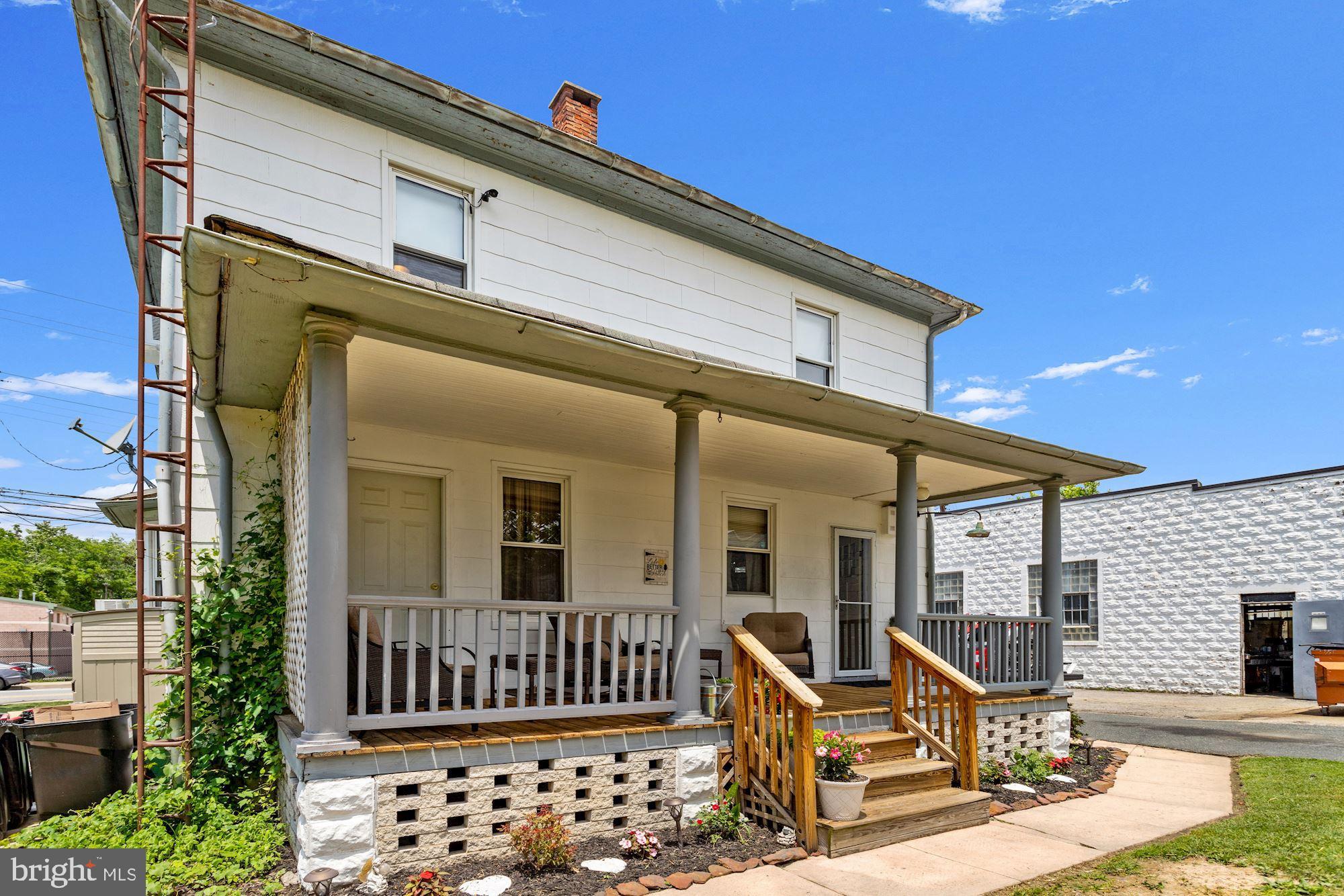 8029 Philadelphia Road Baltimore, MD 21237 - Photo 23 of 29 a front view of a house with glass windows