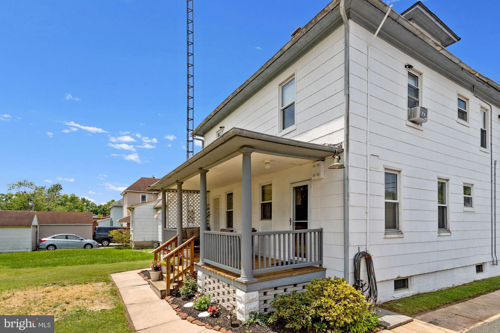 8029 Philadelphia Road Baltimore, MD 21237 - Photo 24 of 29 a front view of a house with garden