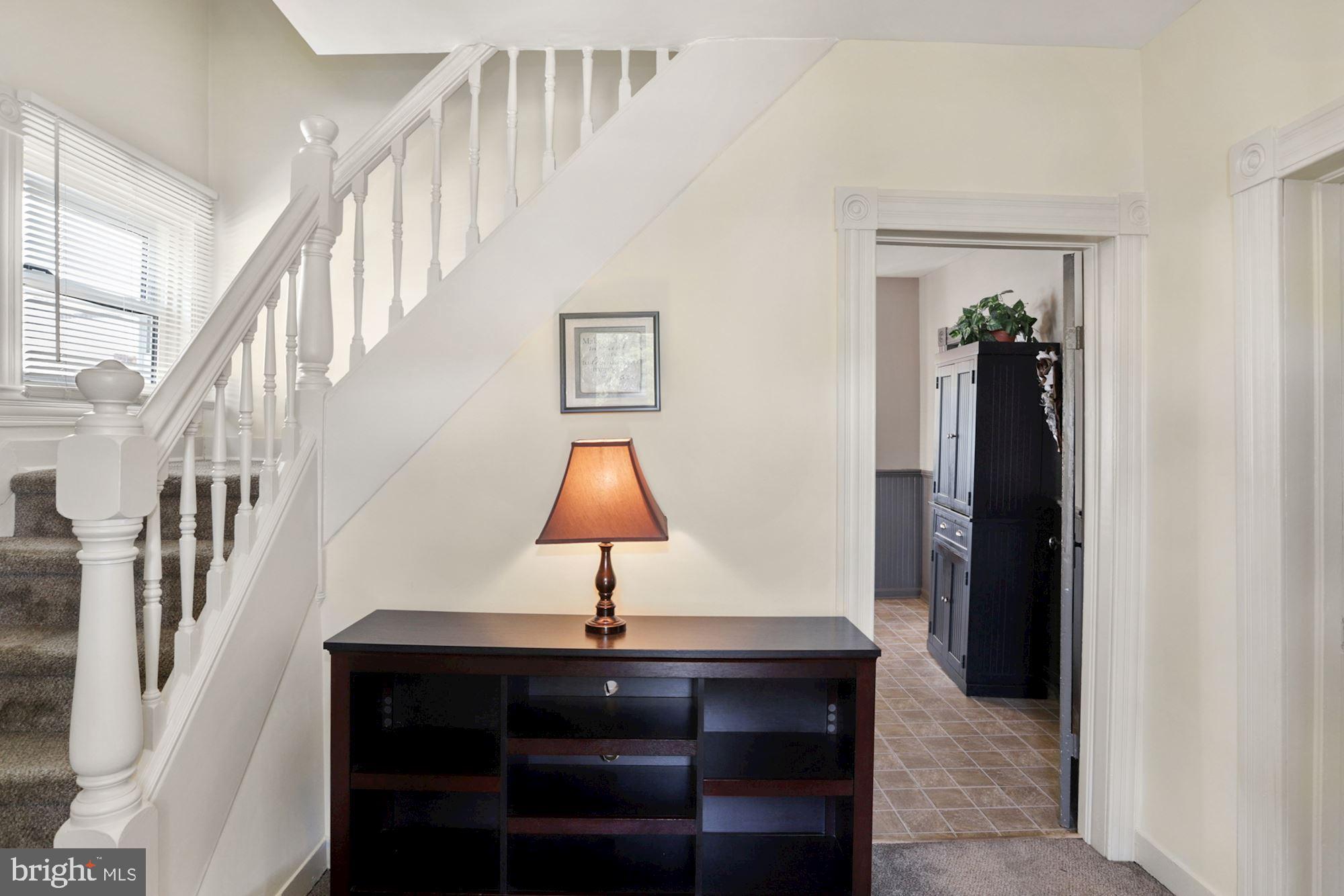 8029 Philadelphia Road Baltimore, MD 21237 - Photo 5 of 29 a view of entryway and hall with wooden floor