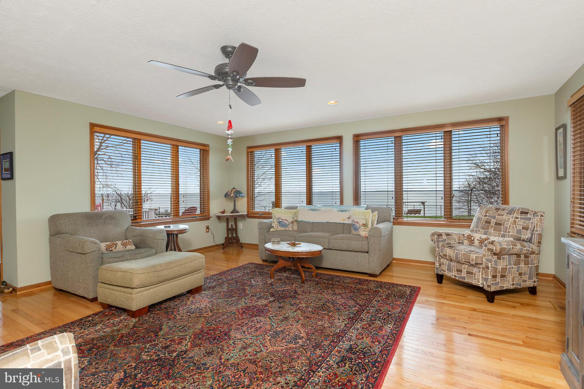 17191 Piney Point Road Piney Point, MD 20674 - Photo 13 of 45 family room w/ stunning views; Andersen windows