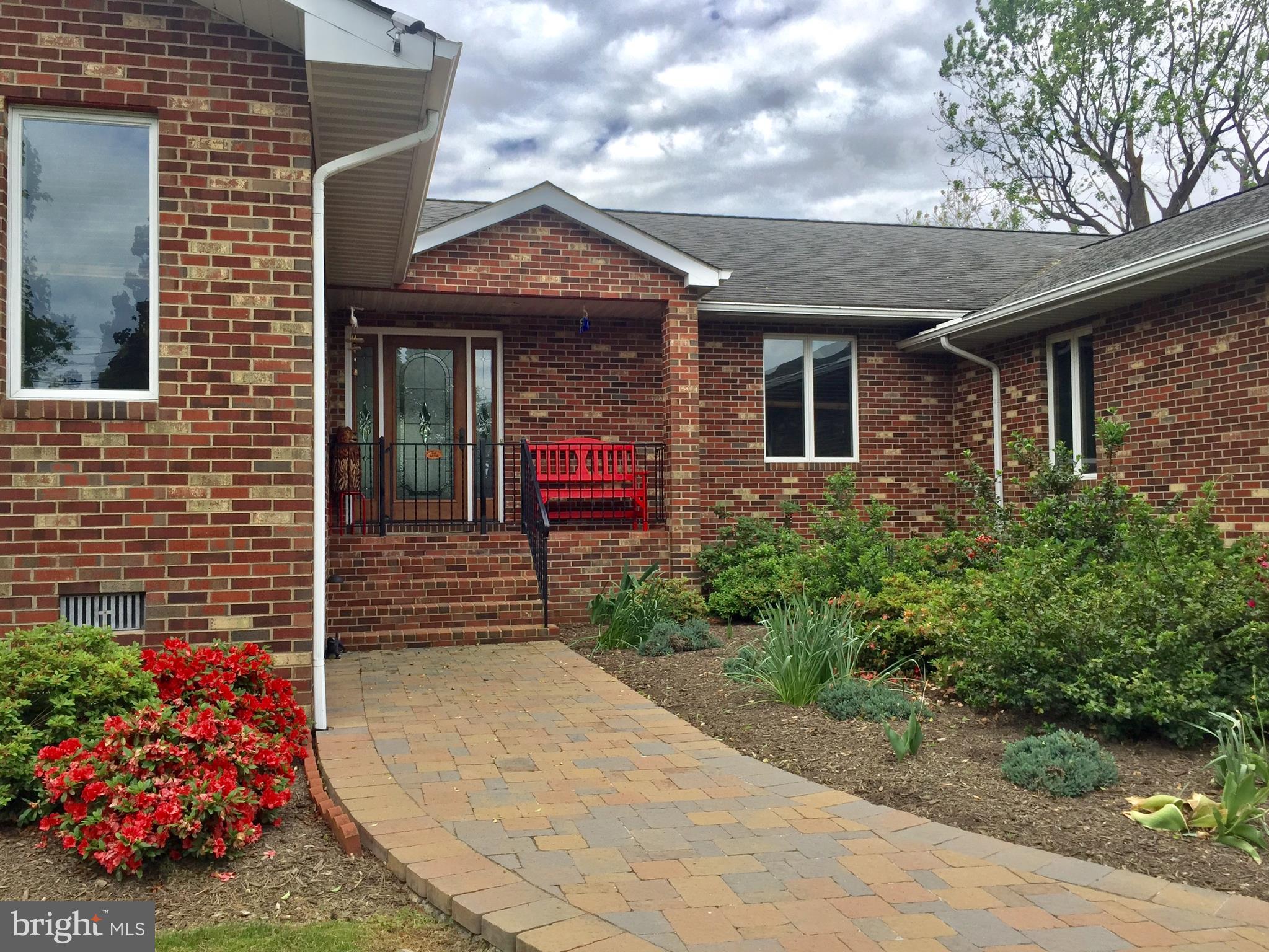 17191 Piney Point Road Piney Point, MD 20674 - Photo 23 of 45 lovely landscaping; covered front entry