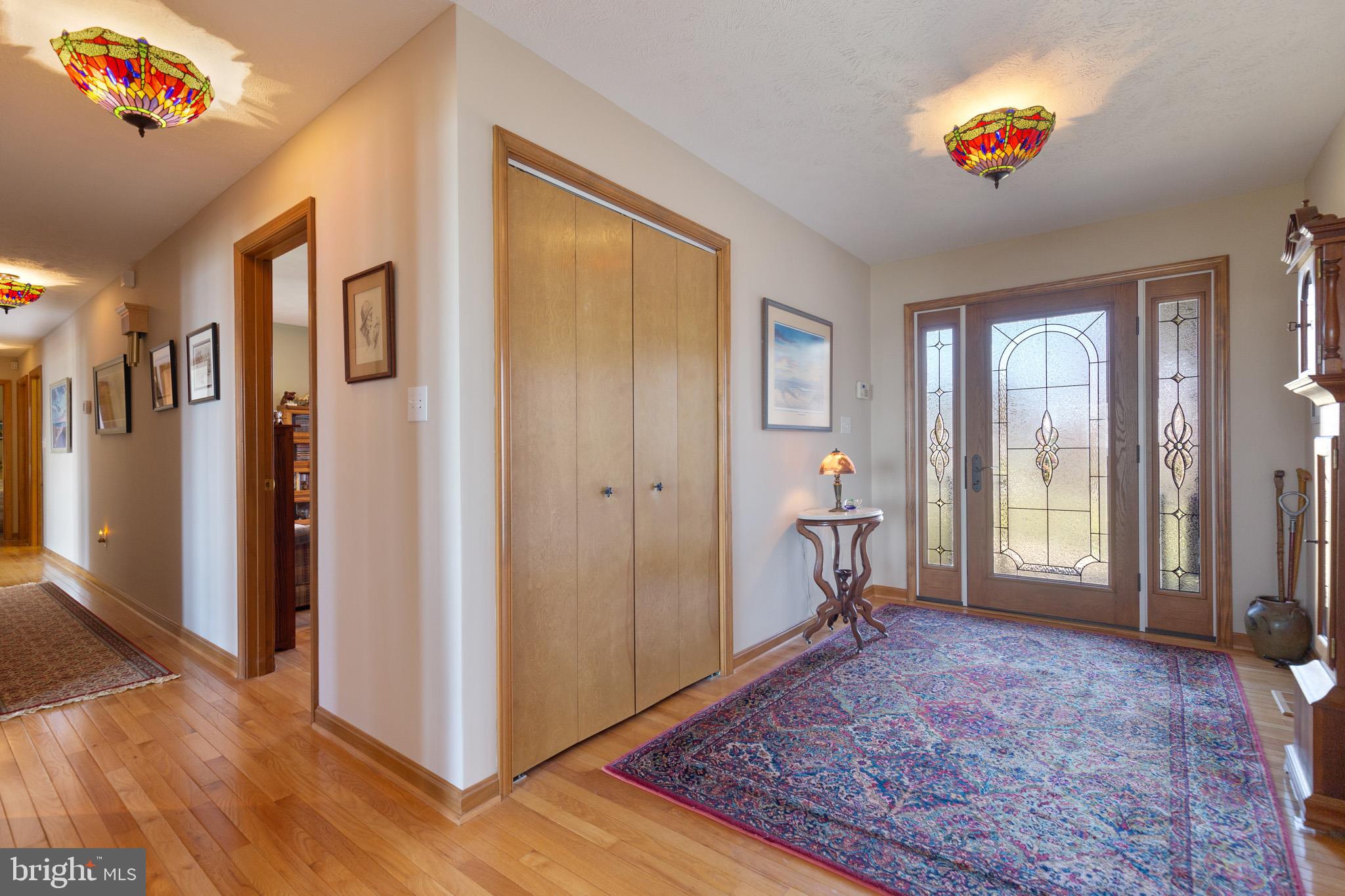 17191 Piney Point Road Piney Point, MD 20674 - Photo 4 of 45 Custom front door opens into spacious entry foyer