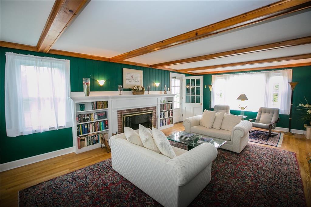 129 Paradise Road Bethel, ME 04217 - Photo 11 of 25 Spacious living area with wood...