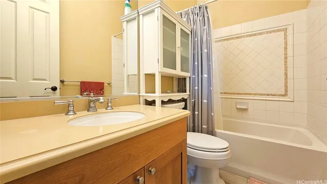 a bedroom with a bed and a table