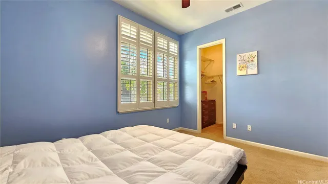 a view of a room with table and a chair
