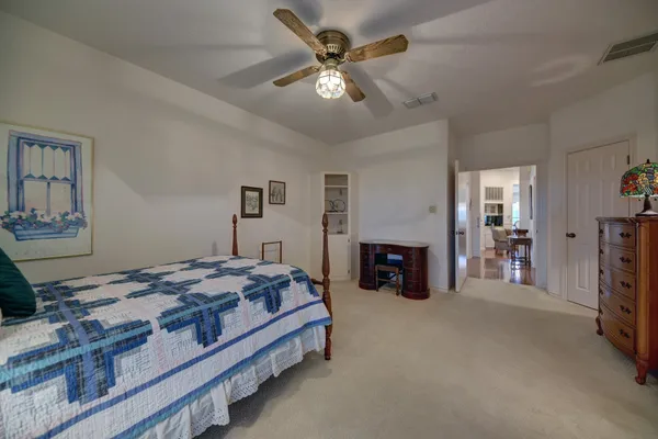 a bed room with furniture and a fireplace