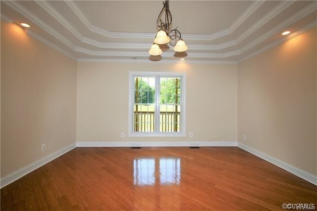 1629 Log Cabin Road Beaverdam, VA 23015 - Photo 12 of 40 an empty room with wooden floor and windows