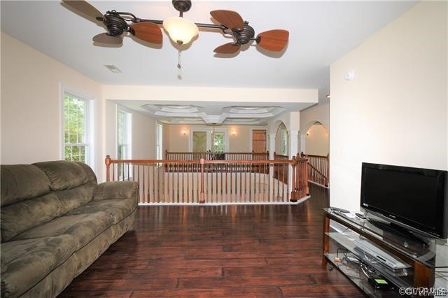 1629 Log Cabin Road Beaverdam, VA 23015 - Photo 26 of 40 a living room with couches and a flat screen tv