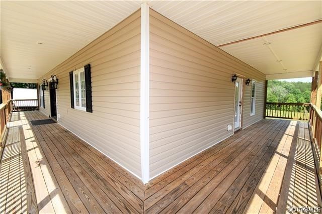 1629 Log Cabin Road Beaverdam, VA 23015 - Photo 39 of 40 a view of a house with a balcony