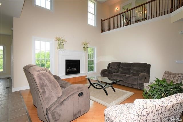 1629 Log Cabin Road Beaverdam, VA 23015 - Photo 7 of 40 a living room with furniture fireplace and potted plant