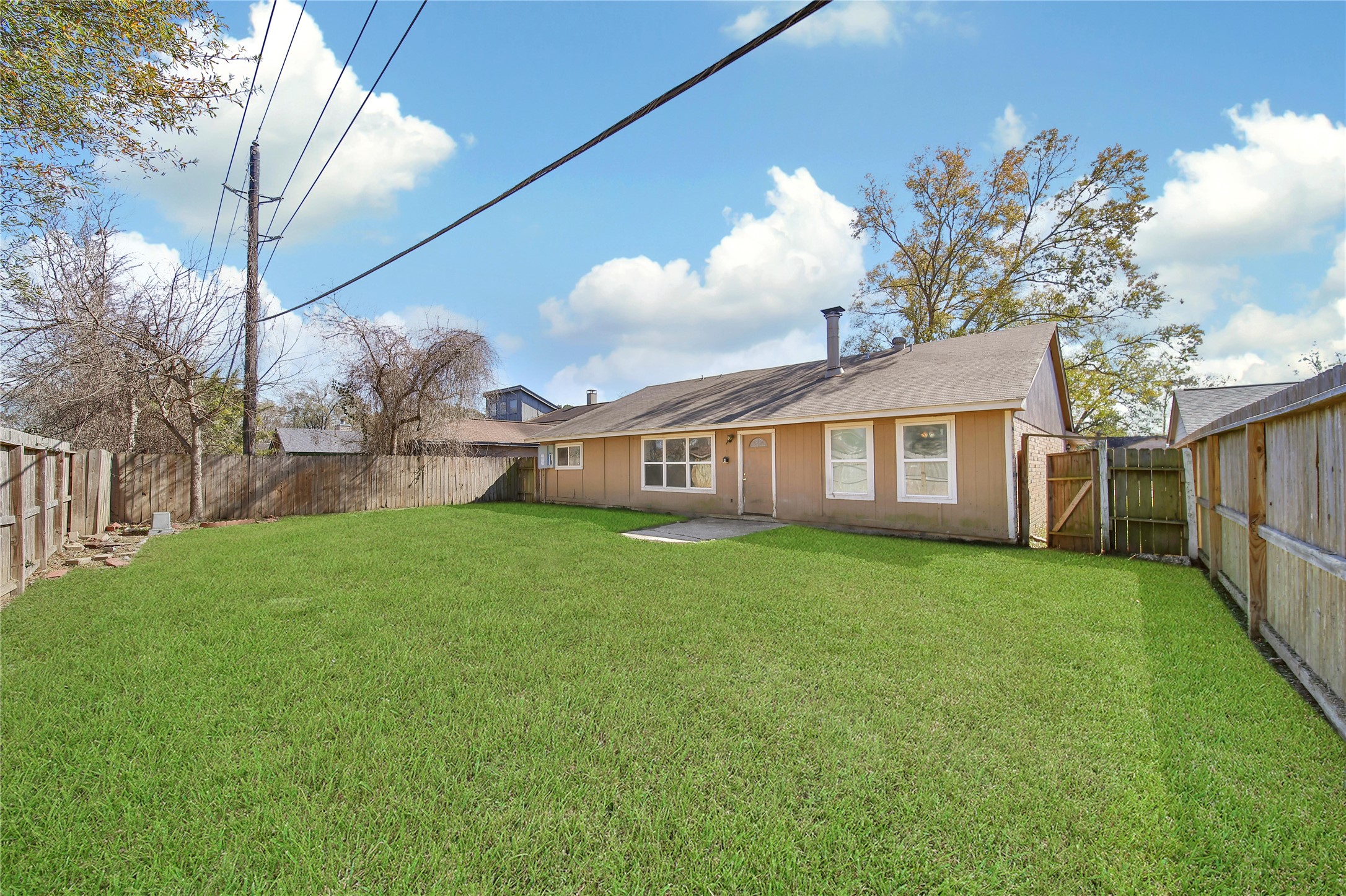 426 North Compass Rose Circle Crosby, TX 77532 - Photo 13 of 13 a view of a house with backyard and garden