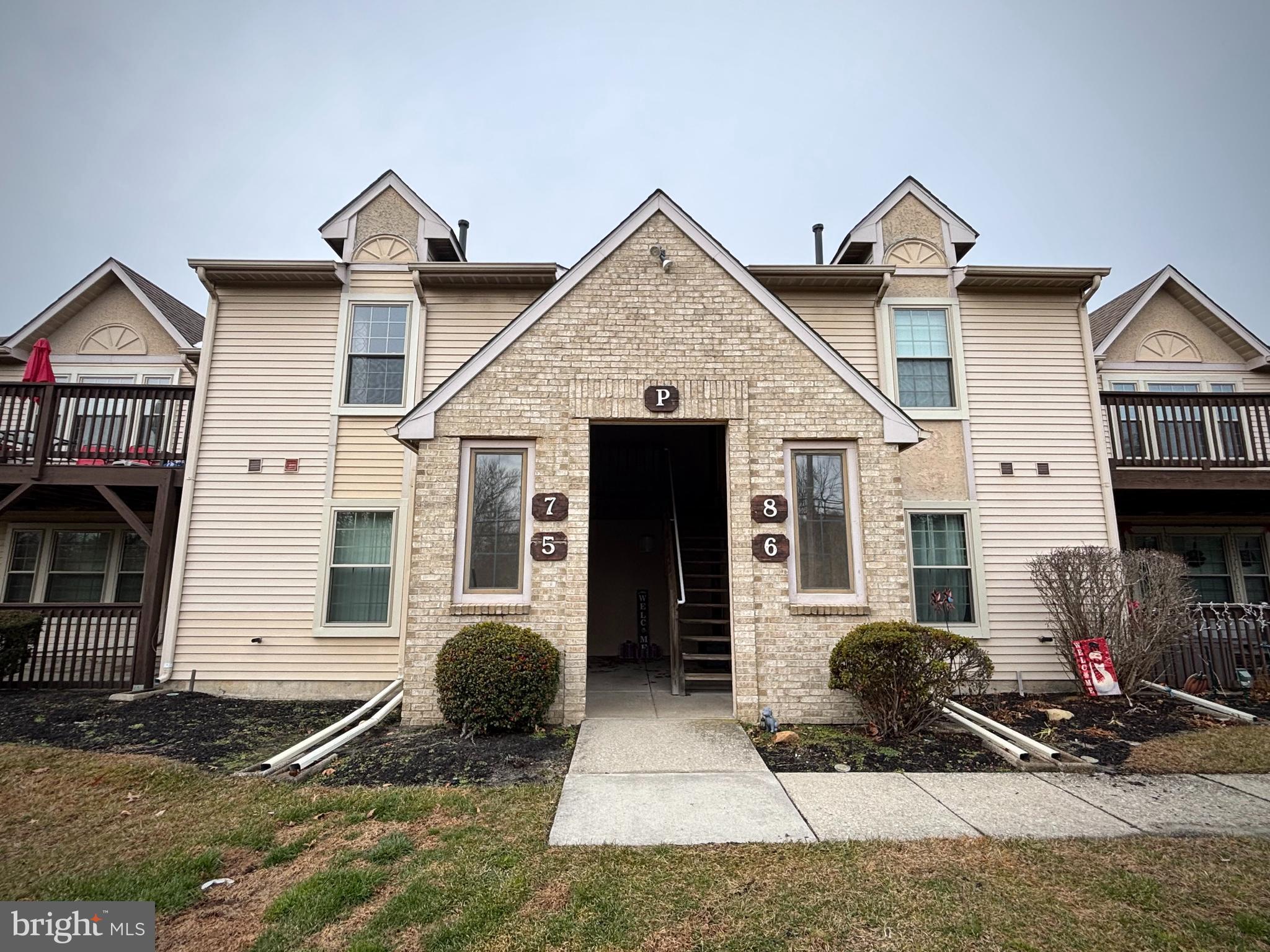 5 Neville Court Sewell, NJ 08080 - Photo 1 of 23 a front view of a house with glass windows