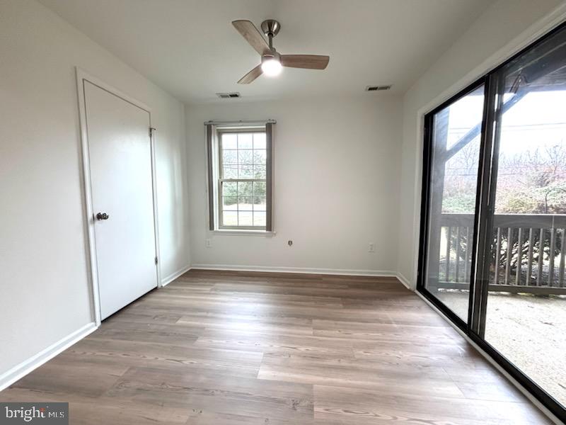 5 Neville Court Sewell, NJ 08080 - Photo 11 of 23 wooden floor in an empty room with a window