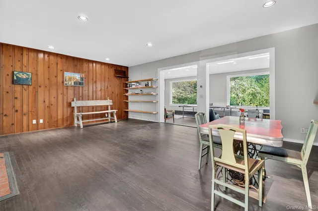 a view of a livingroom with furniture window and outside view