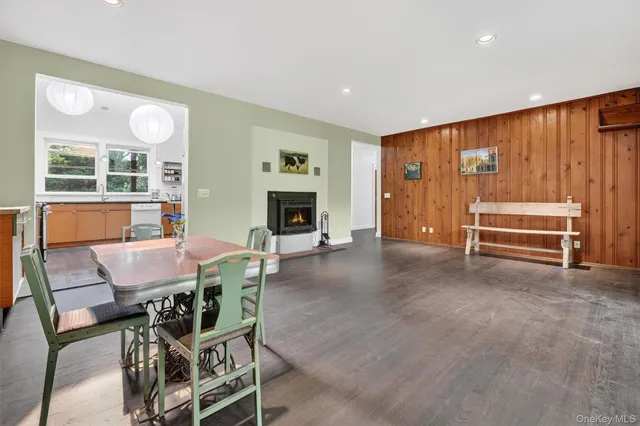 a view of a livingroom with furniture and window