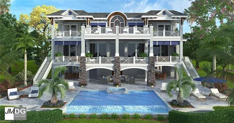 a front view of a house with yard porch and furniture