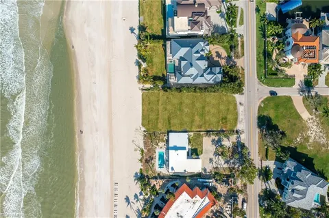 a room with lots of residential buildings and ocean view