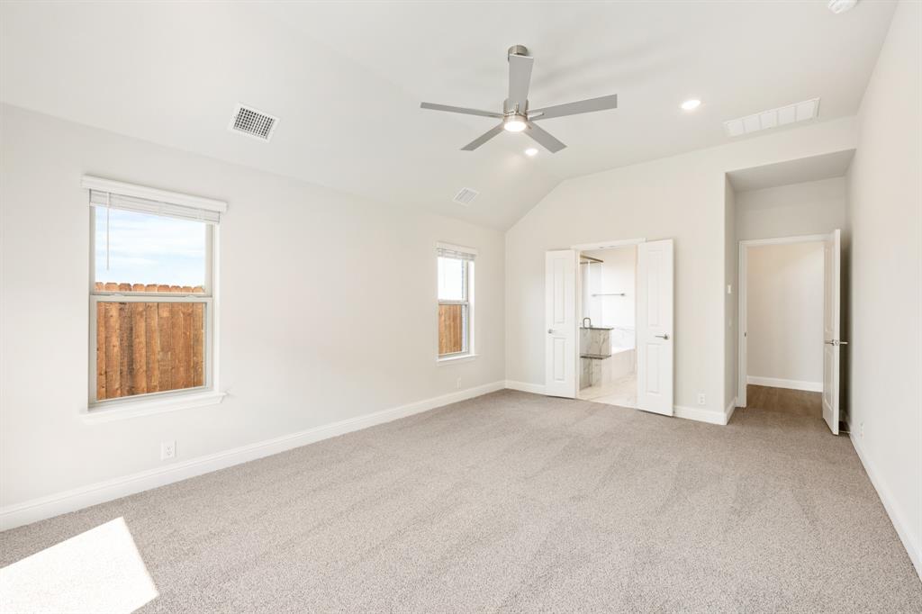 3512 Granite Rapids Road Mesquite, TX 75181 - Photo 22 of 40 an empty room with fan and windows