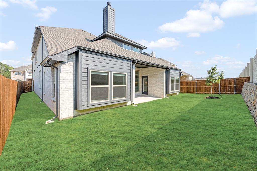 3512 Granite Rapids Road Mesquite, TX 75181 - Photo 38 of 40 a view of a house with backyard