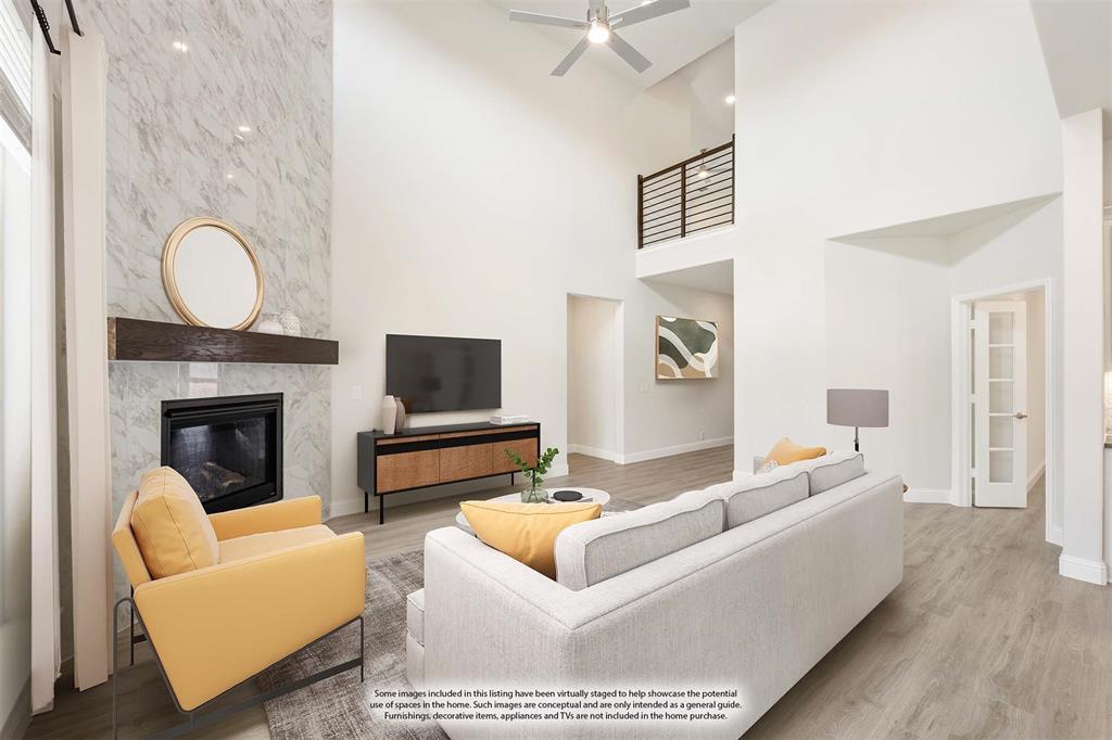 3512 Granite Rapids Road Mesquite, TX 75181 - Photo 9 of 40 a living room with furniture and a fireplace