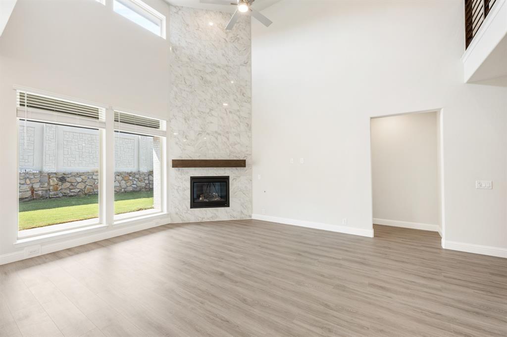 3512 Granite Rapids Road Mesquite, TX 75181 - Photo 10 of 40 a view of an empty room with wooden floor and a window